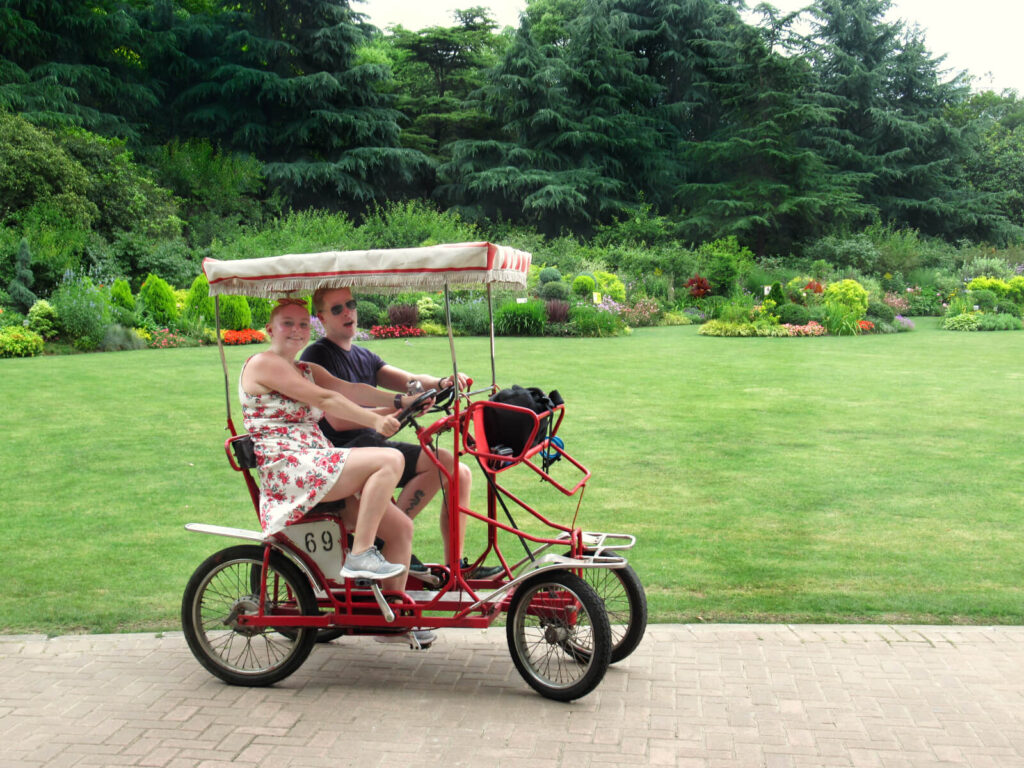 Zoe and boy Zoe enjoying a quadricycle in Shanghai's Century Park - a totally cool and efficient way to explore this huge park. Make sure this is part of your Shanghai 5-day itinerary!