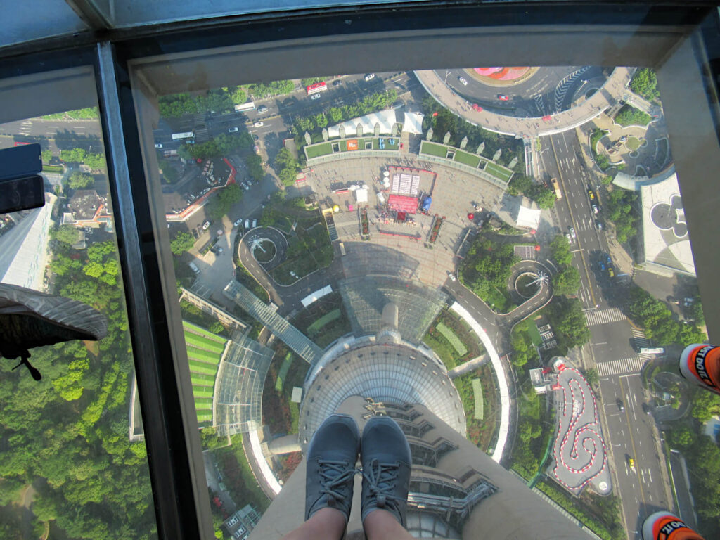 Looking down from the skydeck in the Shanghai TV Tower - 259 metres above the ground, and only glass stopping me from plummeting to my death! This alone is worth the entry fee to the TV tower!