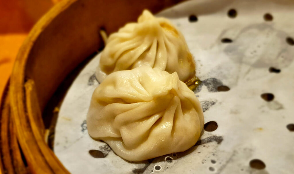 Shanghai speciality of xiaolongbao - meat soup dumplings. These are so amazing I would recommend putting a xiaolongbao restaurant on Shanghai 5-day itinerary!