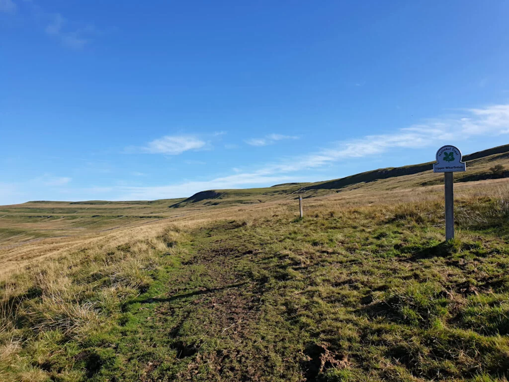 The ascent to Buckden Pike via Upper Wharfedale. Vast fields climbing steeply towards the summit.