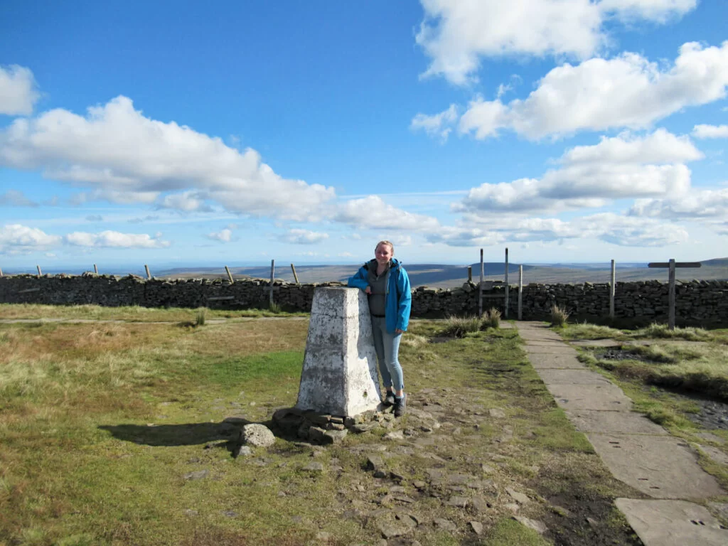 Zoe stood at the summit of Buckden Pike by it's trig point. Beautiful day for a walk!