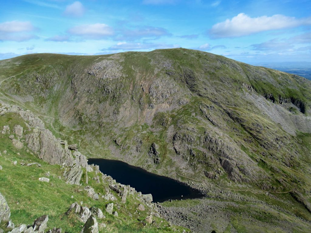 Overlooking Goat's Water and the top of the Old Man of Coniston on this circular walk route