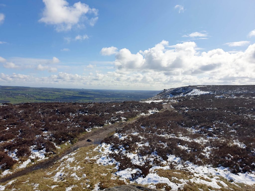 Looking east over Ilkley Moor with the snowy ground clear in the image foreground.