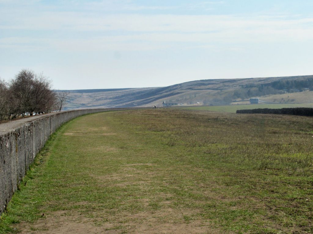 The grassy path along Grimwith Reservoir wall - the home straight of this walk!