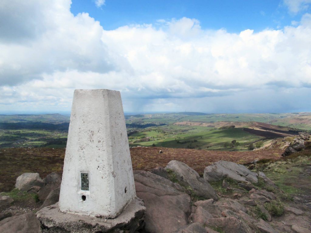 The trig point of The Roaches. The walk is worth it for the amazing views over the Peak District!