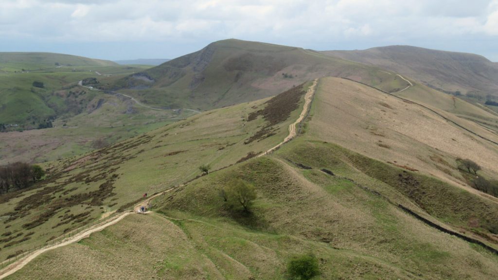 Looking west from the summit of Back Tor towards Mam Tor at the far end of the path. Combine Back Tor and Mam Tor in this circular route from Castleton