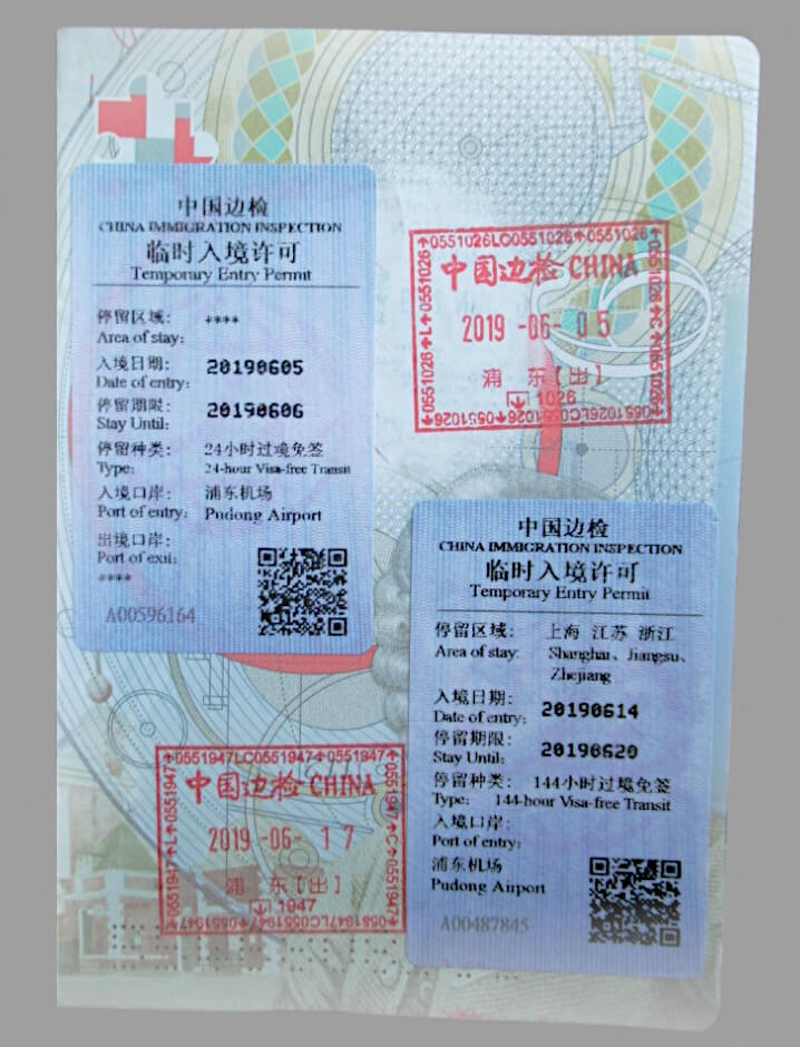 Open passport page showing a 24-hour China Transit Visa and 144-hour China Transit Visa issued at Shanghai Pu Dong Airport and exit stamps