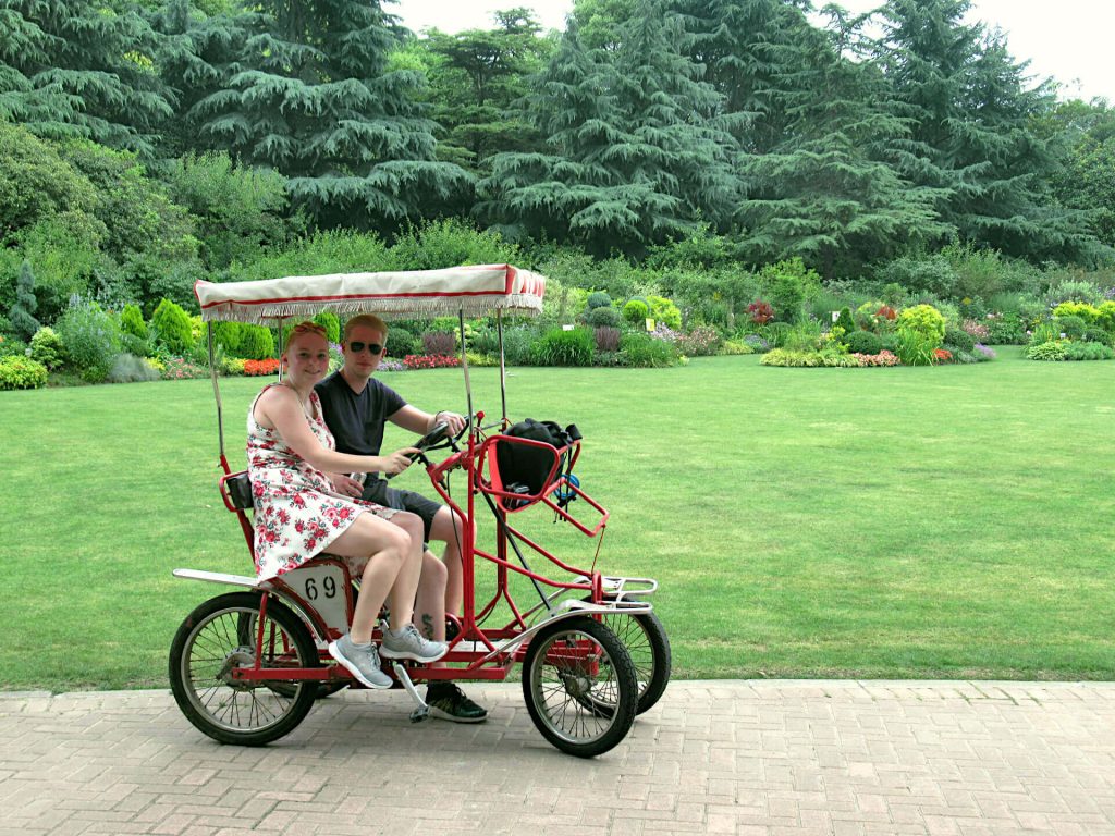 Zoe on a four-wheeled, two-seater bike in Century Park, Shanghai