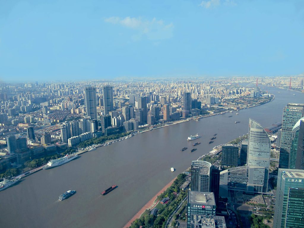 View looking North-West from the top the Pearl Oriental Tower, thousands of high-rise buildings can be seen disappearing into the horizon showing the true scale of the size of Shanghai