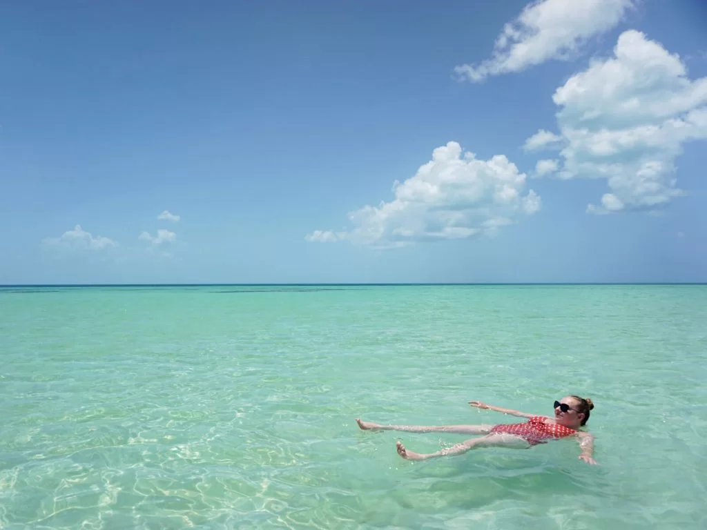 The sea at Punta Mosquito just doesn't compare to anywhere else! Zoe is floating in the shallow sea off of Holbox